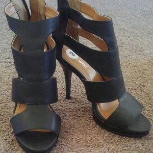 Black cut out heels with zipper back